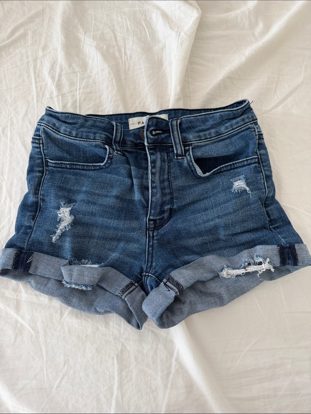 Packing denim shorts